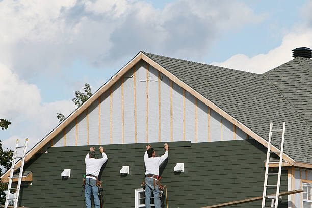 Professional Siding Contractor technician working in Lowell, IN